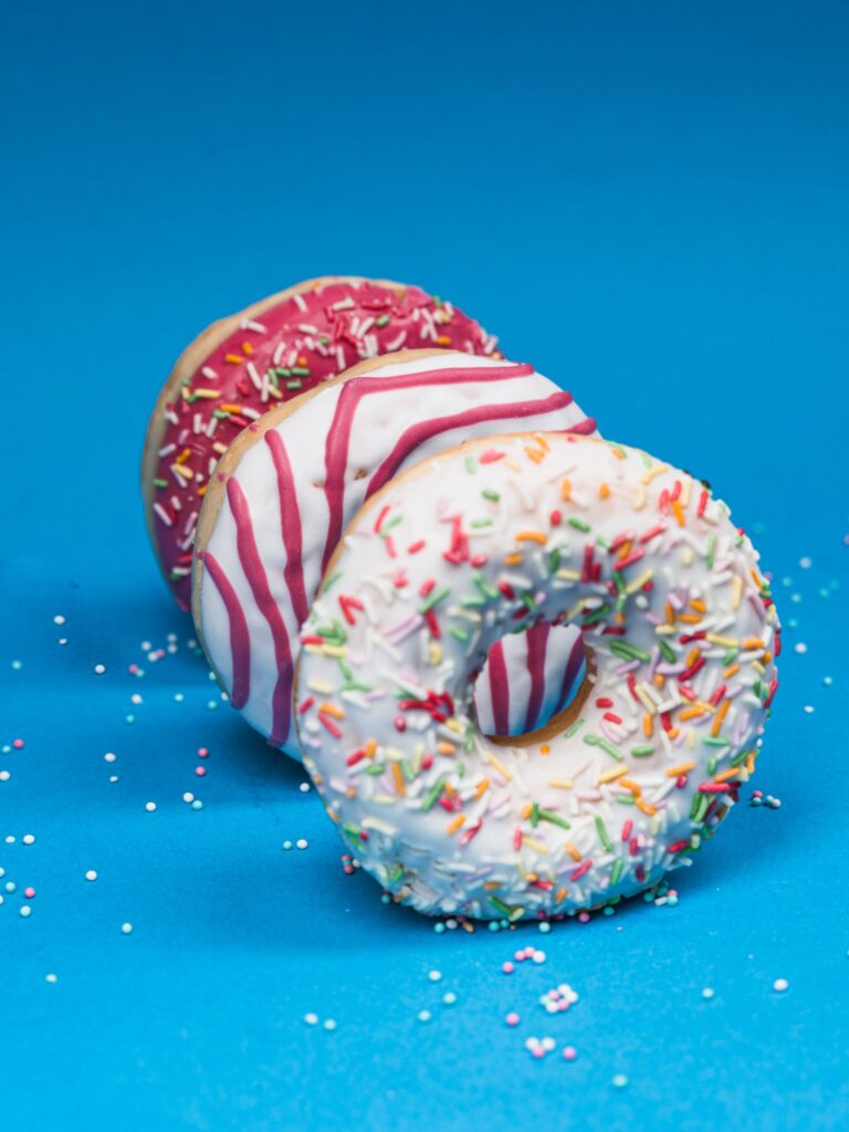 Photo of Donuts on a Blue Surface